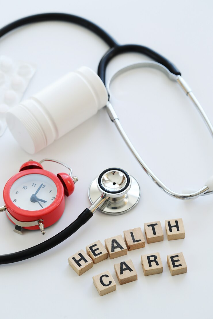 wooden blocks spelling out "health care"